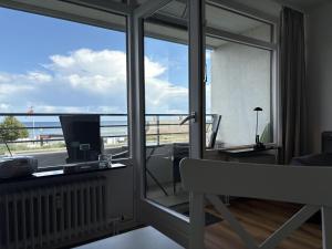 En balkon eller terrasse på Strandhotel - 19 "Sardinenbüchse"