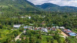 an aerial view of a village in the mountains at Villa Kokini in Koh Samui