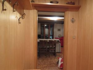 a view of a dining room with a dining table at La casa di Marta, charme e relax in Breuil-Cervinia