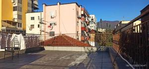 a view of a balcony of a building at ROYAL Hostel in Tirana