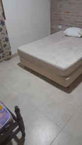 Ένα ή περισσότερα κρεβάτια σε δωμάτιο στο Alquiler Casa Tafi del Valle +5 φωτογραφίες