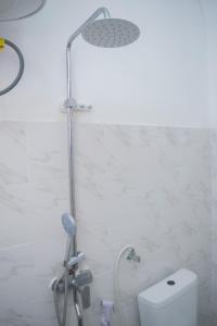 Koupelna v ubytování Mudi House + 117 fotografií