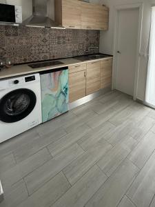 Kuchyň nebo kuchyňský kout v ubytování Apartamento Palmeras en el Mar + 10 fotografií