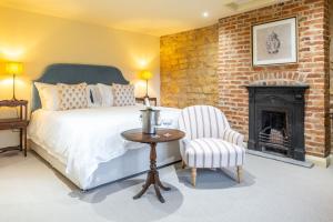 En eller flere senge i et værelse på Abbey Grange