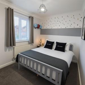 Ένα ή περισσότερα κρεβάτια σε δωμάτιο στο Bright and Spacious Blackwood Home 4 Bedroom Sleeps 8