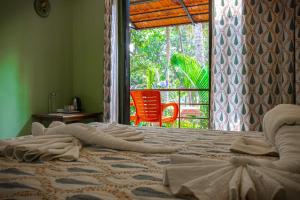 Ένα ή περισσότερα κρεβάτια σε δωμάτιο στο resort zulley +34 φωτογραφίες