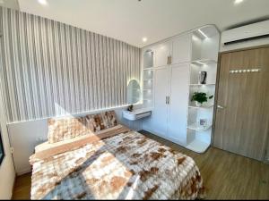 Ένα ή περισσότερα κρεβάτια σε δωμάτιο στο Modern 1BR with Balcony Park View Hanoi +4 φωτογραφίες