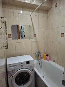 Et badeværelse på Cozy apartment