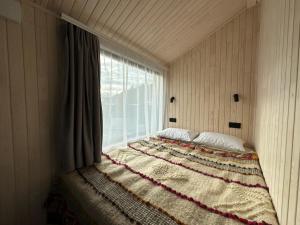 Ένα ή περισσότερα κρεβάτια σε δωμάτιο στο Grey House