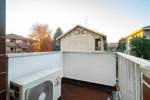 Balkón nebo terasa v ubytování Modern Apartment 5 Minutes from Rho