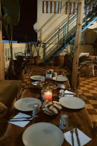 Un restaurant sau alt loc unde se poate mânca la Muza Guest House