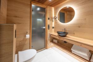 Koupelna v ubytování Wilderness Hotel Kieppi + 28 fotografií