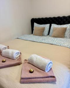 Aurora Lux Apartman客房内的一张或多张床位