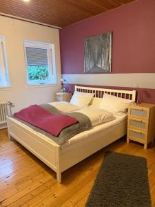 Ένα ή περισσότερα κρεβάτια σε δωμάτιο στο Zum Burggraf