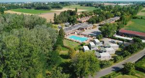an aerial view of a house with a swimming pool at Hotiday Bologna Arena in Bologna