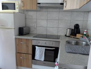 Kuchyň nebo kuchyňský kout v ubytování Casa da Lena