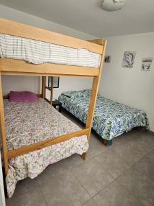 Postel nebo postele na pokoji v ubytování Departamento en Playa San Bartolo Con terraza