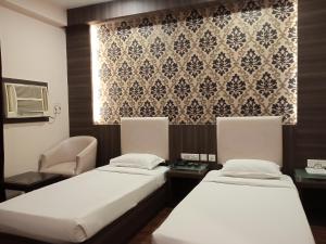 Ένα ή περισσότερα κρεβάτια σε δωμάτιο στο Hotel The Sojourn