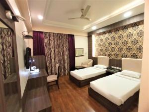 Ένα ή περισσότερα κρεβάτια σε δωμάτιο στο Hotel The Sojourn