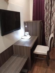 Μια τηλεόραση ή/και κέντρο ψυχαγωγίας στο Hotel The Sojourn