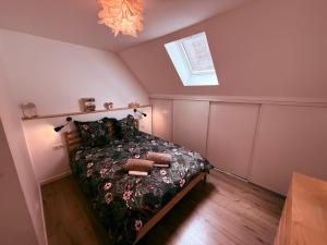 Ένα ή περισσότερα κρεβάτια σε δωμάτιο στο Chalet du parc AX