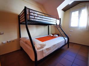 En eller flere senge i et værelse på IMEDA apartamentos ARTTYCO