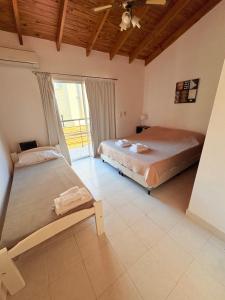 En eller flere senge i et værelse på Apart Nivel Cero + 88 billeder