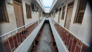 an empty hallway in an old building at BALAN INTERNATIONAL lodging in Chennai