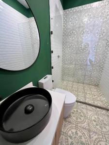 Ένα μπάνιο στο Villa tipo Suite, Privada en Villeta