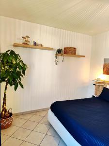 Ένα ή περισσότερα κρεβάτια σε δωμάτιο στο Almarea Beach - Essenza del mare, calore di casa