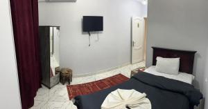 Postel nebo postele na pokoji v ubytování Classic Pyramids inn + 36 fotografií