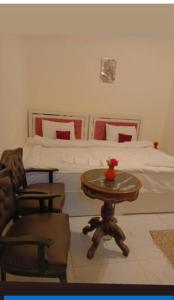 Postel nebo postele na pokoji v ubytování Classic Pyramids inn