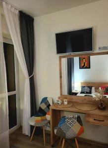 Μια τηλεόραση ή/και κέντρο ψυχαγωγίας στο Pokoje Gościnne U Anny