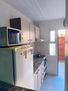 Nhà bếp/bếp nhỏ tại Complejo Althea