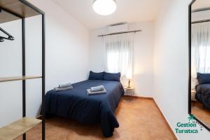 En eller flere senge i et værelse på Casa grande en la Ermita de la Bella