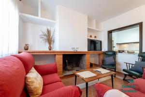 Et tv og/eller underholdning på Casa grande en la Ermita de la Bella