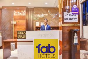 Členové personálu v ubytování FabHotel Prime OM Palace