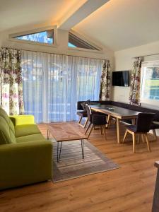 a living room with a ping pong table at Appartements Blumenwiese in Ramsau am Dachstein