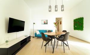 Μια τηλεόραση ή/και κέντρο ψυχαγωγίας στο Le rose di Mimmo Casa vacanze