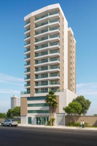 a rendering of a tall apartment building at Vista para as Montanhas in Guarapari