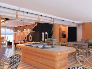 Un lugar para sentarse en ibis Styles La Rochelle Centre les Minimes