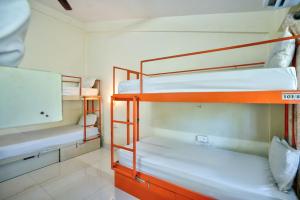 En eller flere senge i et værelse på Green Wave Luxury Resort