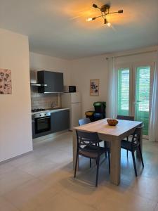 Kuchyň nebo kuchyňský kout v ubytování Le Case di Zefiro