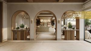 Un vestíbulo con dos entradas arqueadas y una cocina. en Hotel Sirena Hvar, en Hvar