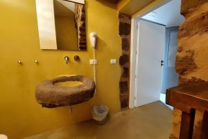 Et badeværelse på Dammuso Civulia Pantelleria + 37 billeder