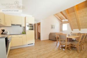 Kuchyň nebo kuchyňský kout v ubytování Alpenperle