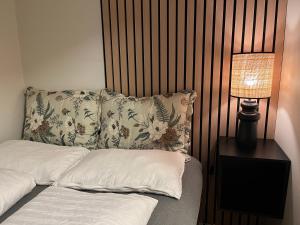 Ένα ή περισσότερα κρεβάτια σε δωμάτιο στο FIVE Apartments