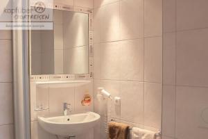 Koupelna v ubytování Alpenperle + 27 fotografií