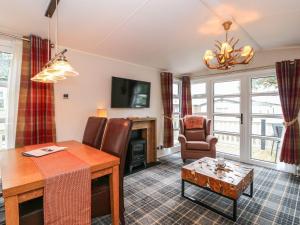 TV/trung tâm giải trí tại Loch Lomond Holiday home