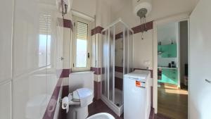 Koupelna v ubytování EMMEVI House + 20 fotografií